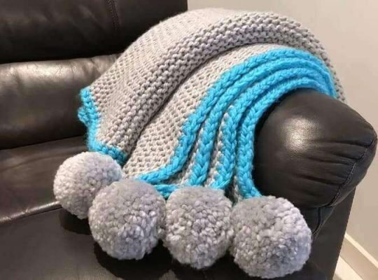 Grey and Aqua Knitted Blanket with Pom Pom